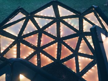 Close-up of metallic structure against sky