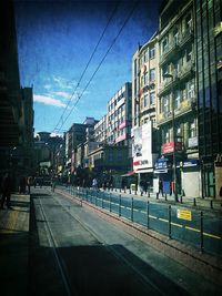 Buildings in city against sky