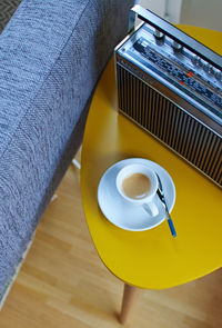 High angle view of coffee cup on table