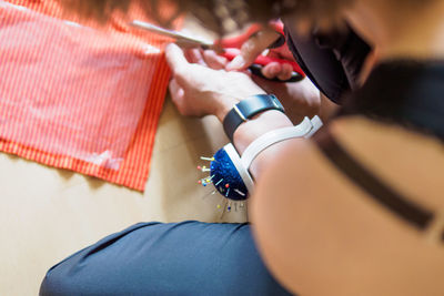 High angle view of dressmaker working