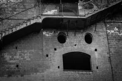 Low angle view of face on exterior of building