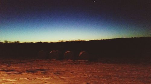 Scenic view of landscape at sunset