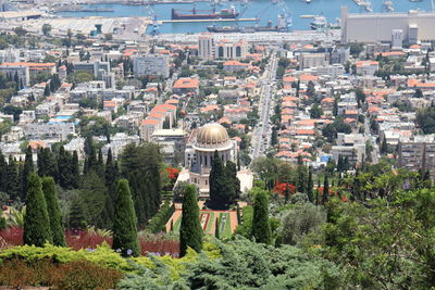 Rear view of city against buildings