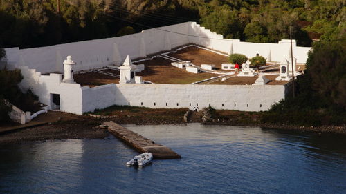 High angle view of cemetery by sea