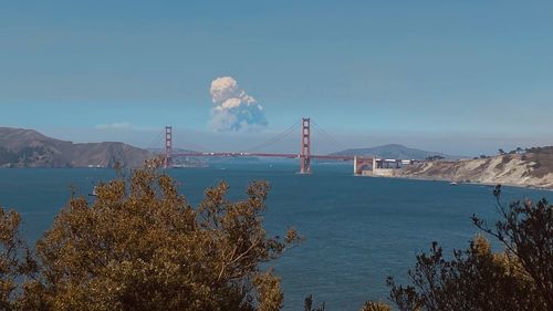 View of suspension bridge over sea