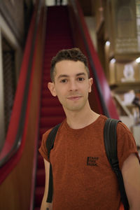 Portrait of young man standing outdoors