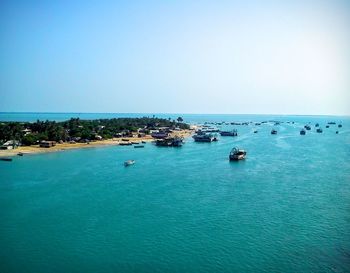 Scenic view of calm sea against clear sky