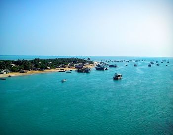 Scenic view of calm sea against clear sky