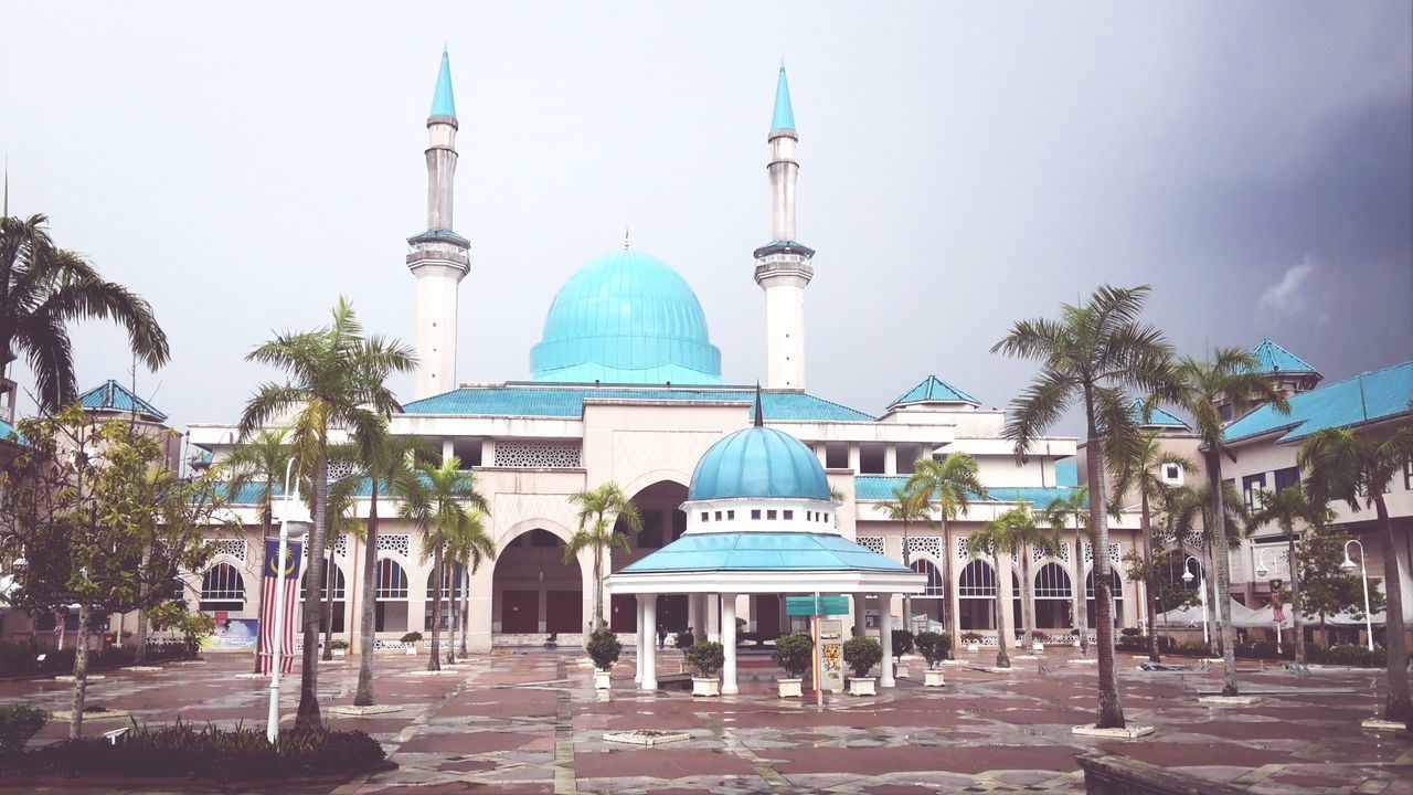 architecture, building exterior, built structure, religion, place of worship, the way forward, church, tree, dome, spirituality, guidance, tower, sky, street, day, direction, incidental people, islam