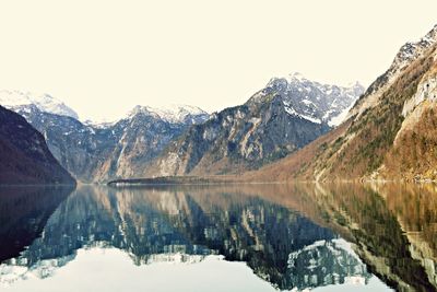 Scenic view of lake with mountains in background