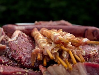 Close-up of meat on barbecue