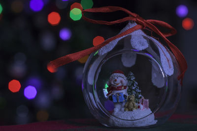 Close-up of christmas decorations on table