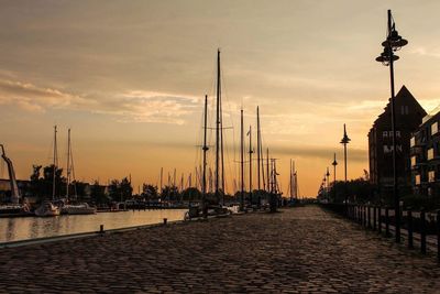 View of harbor at sunset