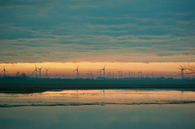 Scenic view of landscape against sky during sunset