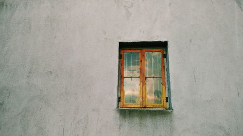 Low angle view of building window