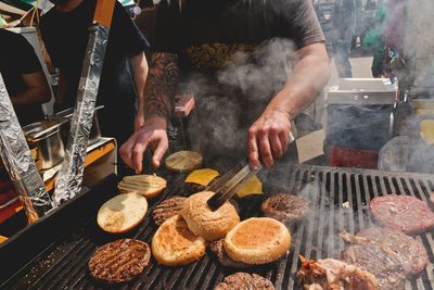 Person preparing food on table