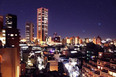 View of city lit up at night