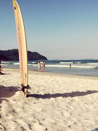 Scenic view of beach against clear sky