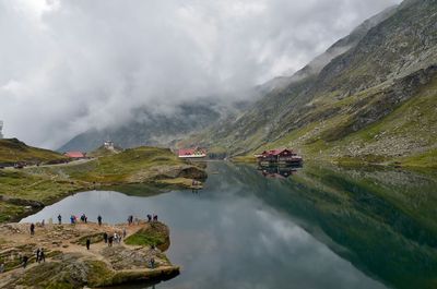 Scenic view of mountains against cloudy sky