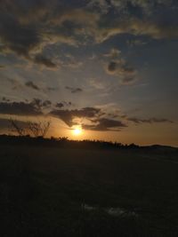 Scenic view of silhouette landscape against sky during sunset