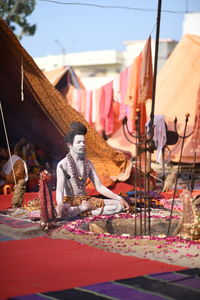 Meditating man in india. sadhu in meditation. kumbh mela.