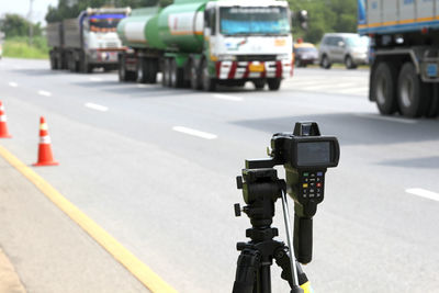 Close-up of camera on road