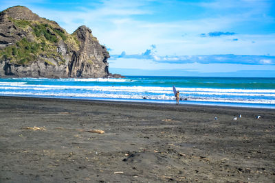 Scenic view of beach against sky