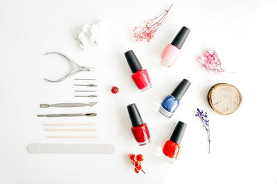 High angle view of objects on table against white background