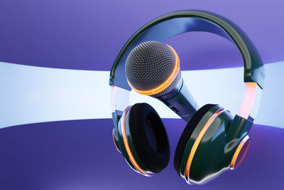 High angle view of headphones against blue sky
