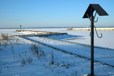 Scenic view of sea against clear blue sky