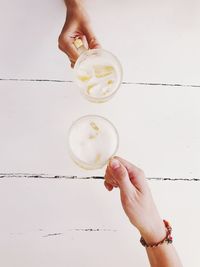 Midsection of woman holding ice cream