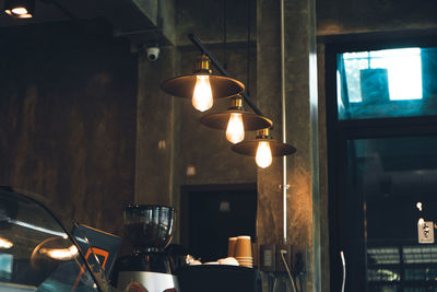 Illuminated pendant light in restaurant