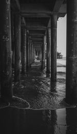 View of pier with bridge in background