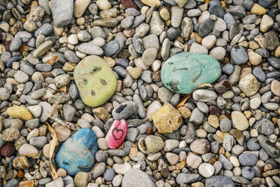 High angle view of stones on pebbles