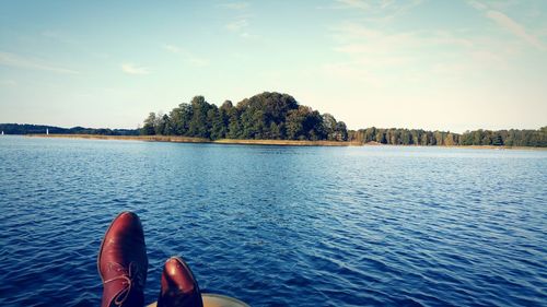 Low section of man by lake