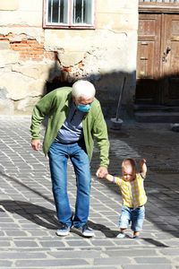 Full length of father and daughter