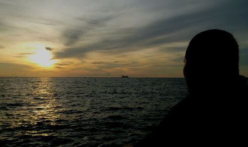 Scenic view of sea at sunset