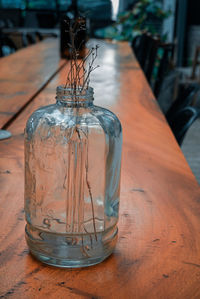 Close-up of glass jar on table