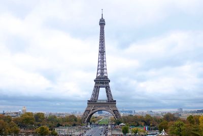 Low angle view of eiffel tower in city against sky