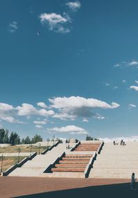 Scenic view of beach against sky on sunny day
