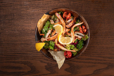 Directly above shot of fruits in bowl on table