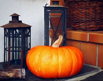 View of orange pumpkins on brick wall