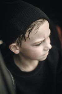 Close-up portrait of man looking away