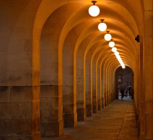 Illuminated corridor of building