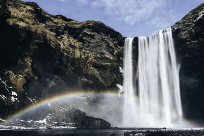 Low angle view of skogafoss