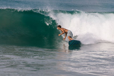 Man surfing in sea