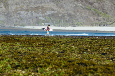 Young man at the beach, sumbawa,indonesia