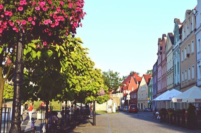 Street in city against clear sky