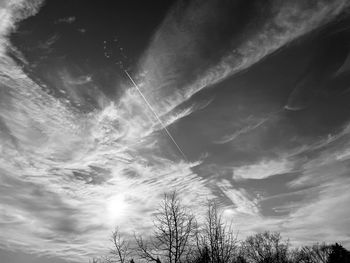 Low angle view of vapor trails in sky