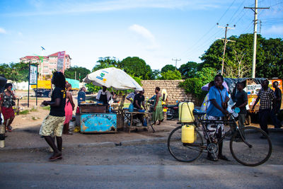 Man riding bicycle on street